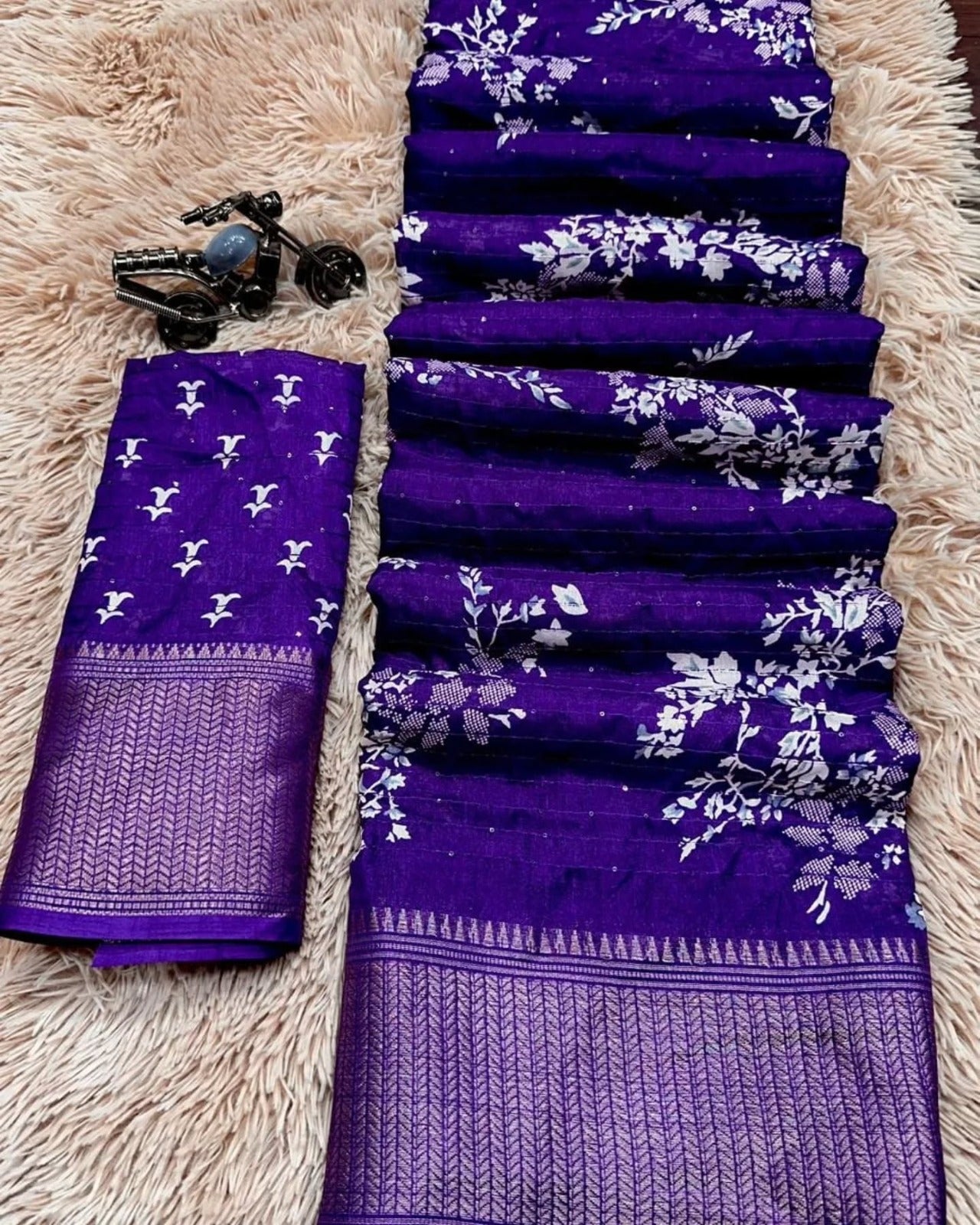 Beautiful dola silk sarees with all over floral design along with contrast weaving border