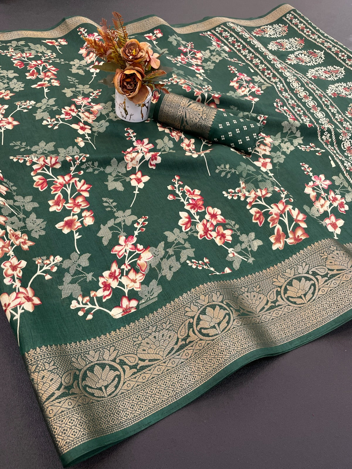 A beautiful dola silk saree with flowers print and weaving border saree