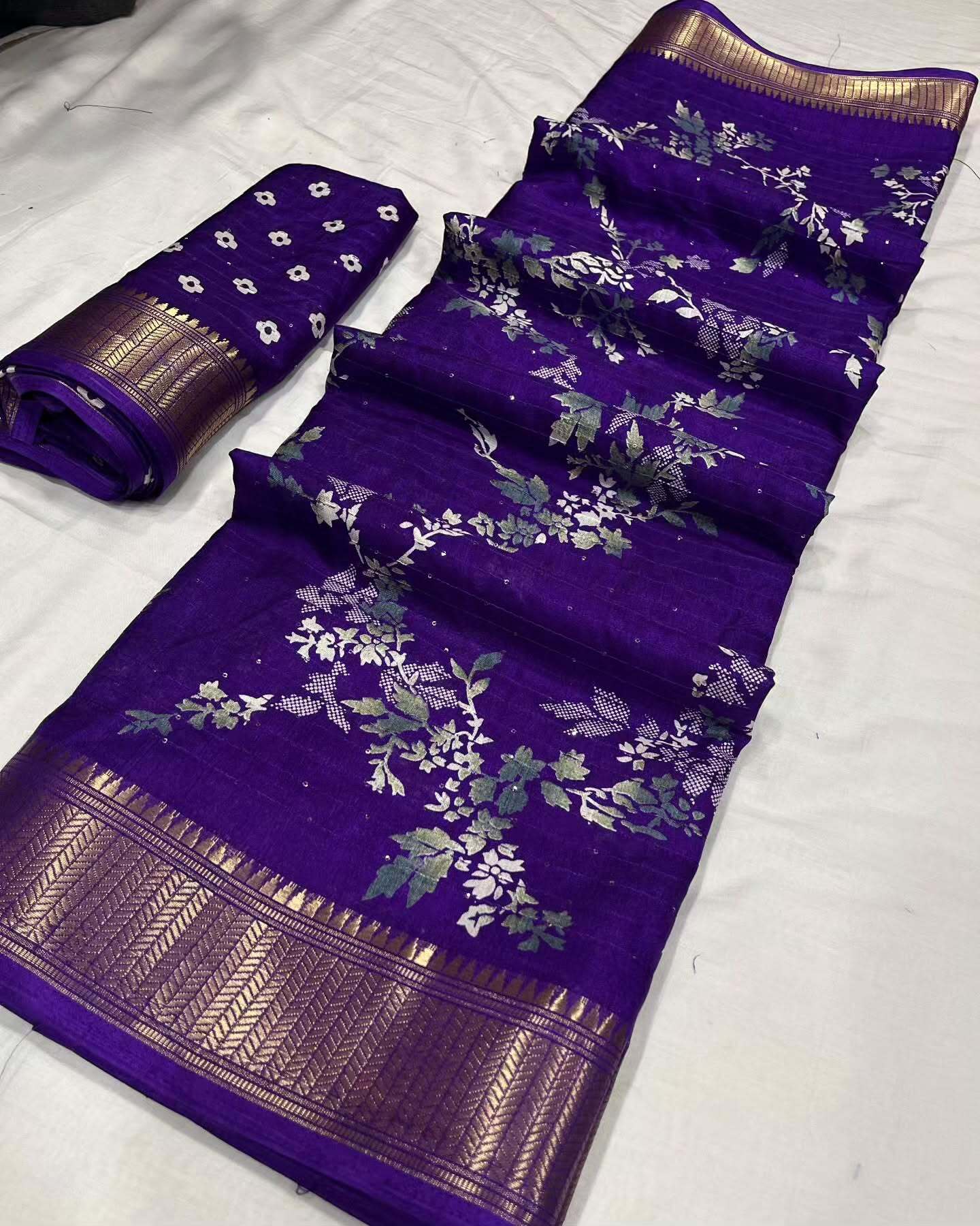 Beautiful dola silk sarees with all over floral design along with contrast weaving border