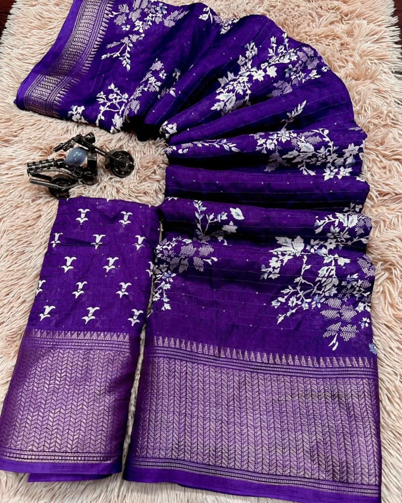 Beautiful dola silk sarees with all over floral design along with contrast weaving border