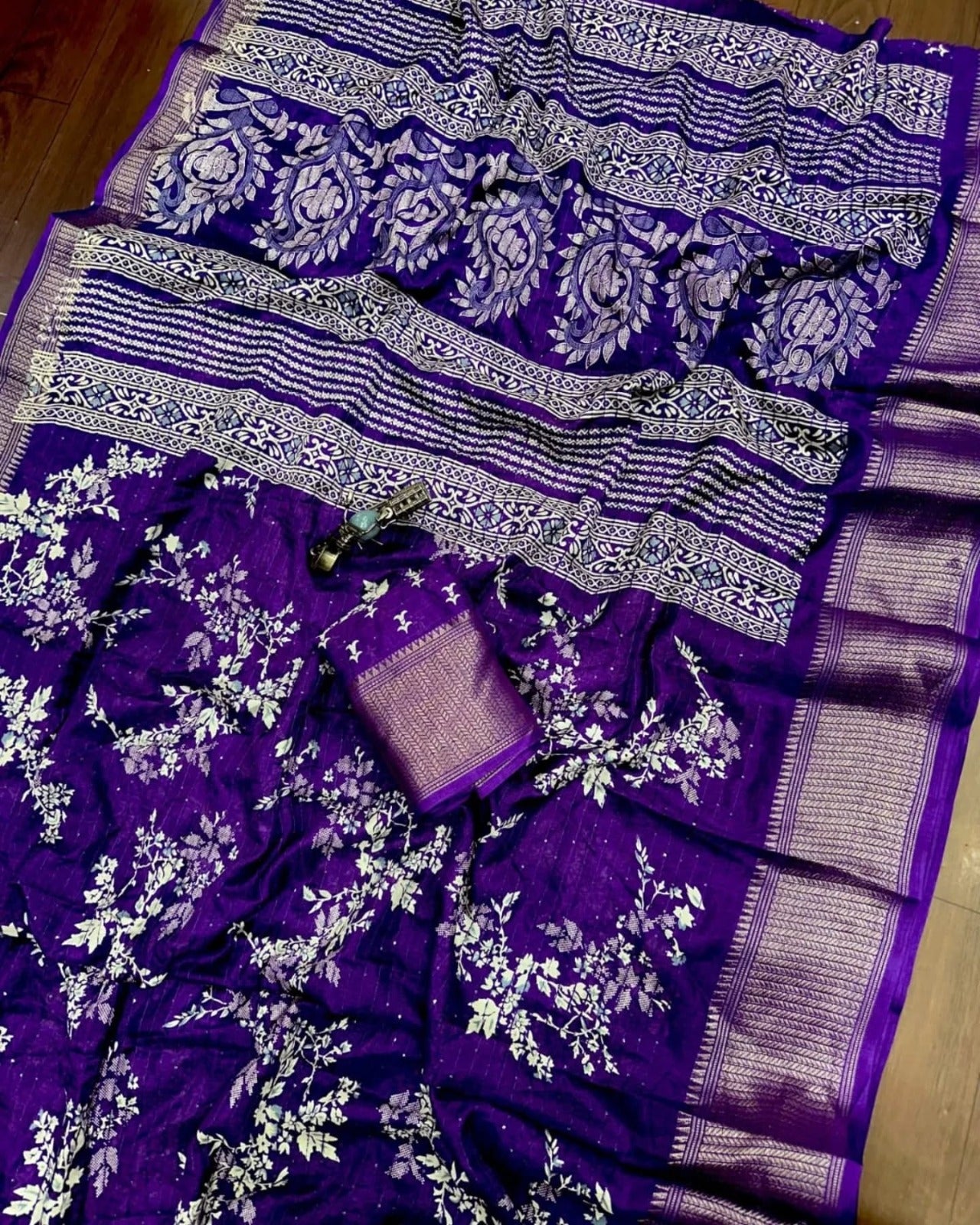 Beautiful dola silk sarees with all over floral design along with contrast weaving border