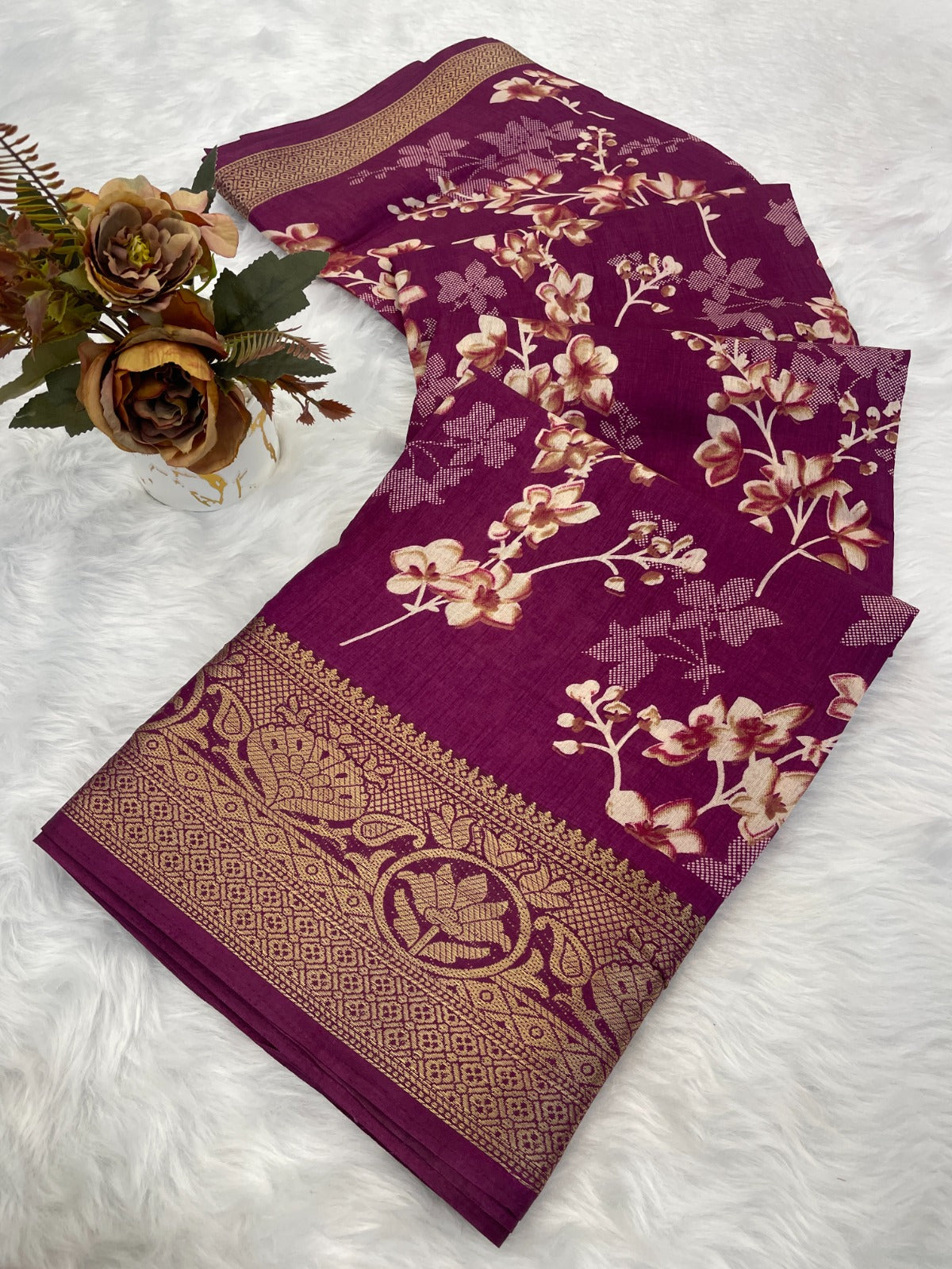 A beautiful dola silk saree with flowers print and weaving border saree
